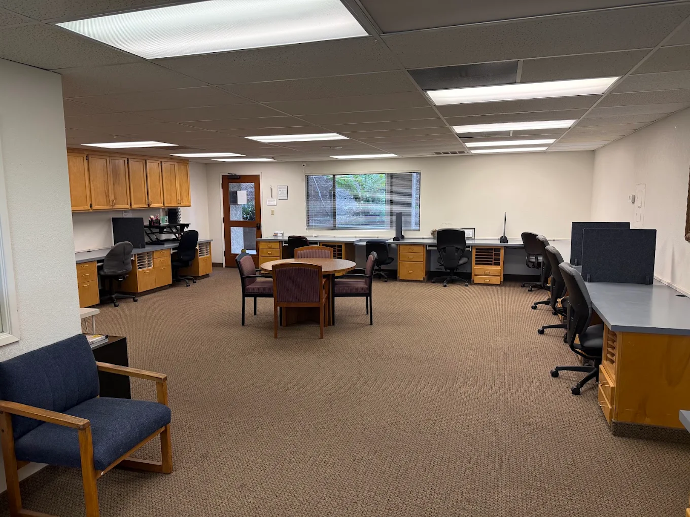 Inside Five Cities Cowork in Arroyo Grande California with desks and office workstations